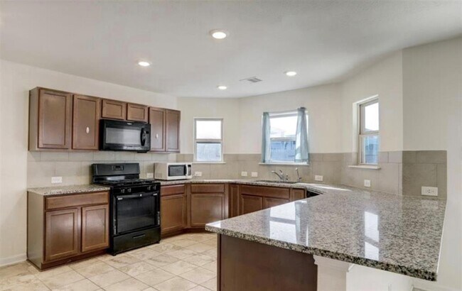 Foto del edificio - 13111 Mills Grove Dr