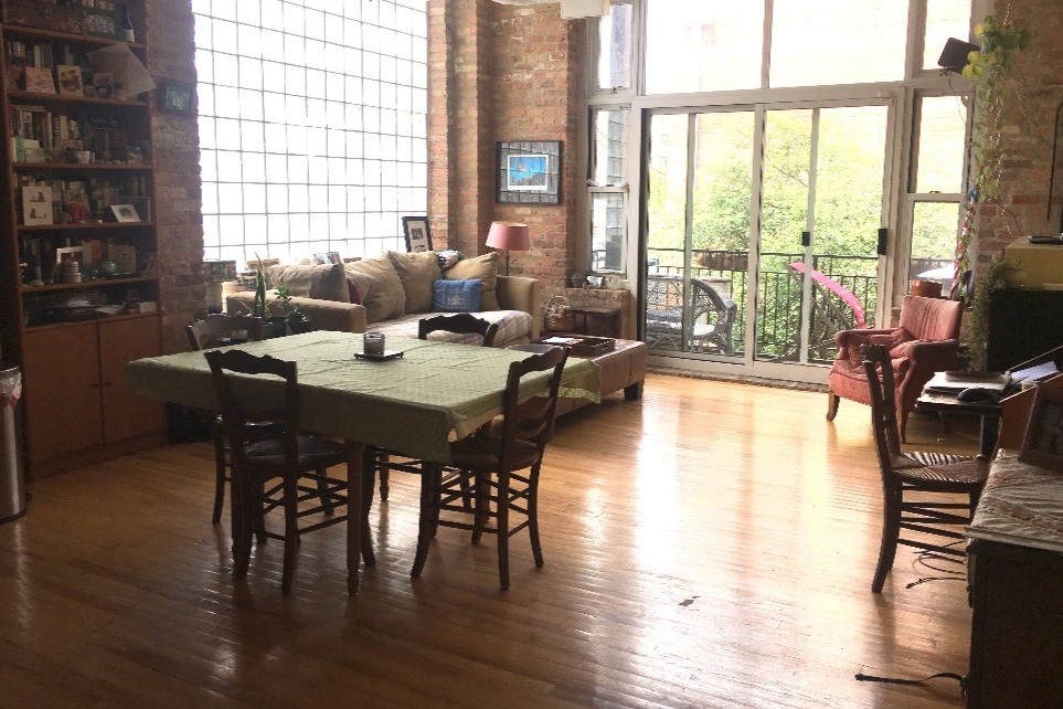 Dining and living room with balcony - 1844 S Michigan Ave