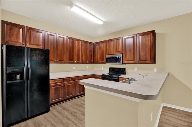 Foto del edificio - 8525 Sandpiper Ridge Ave