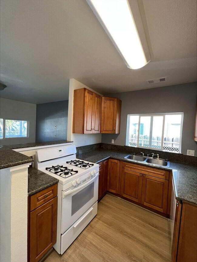 Building Photo - 4136 7th Ave