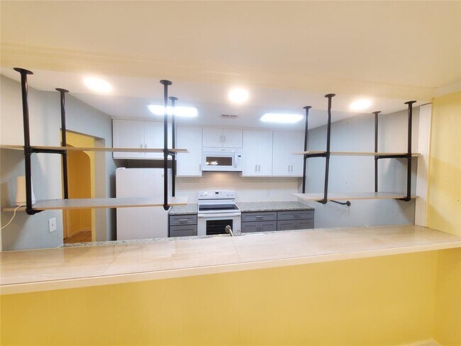 Building Photo - 4525 Altamesa Blvd