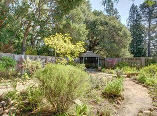 yard and gazebo --the creek in behind the wood fence - 11 Jeffrey Court
