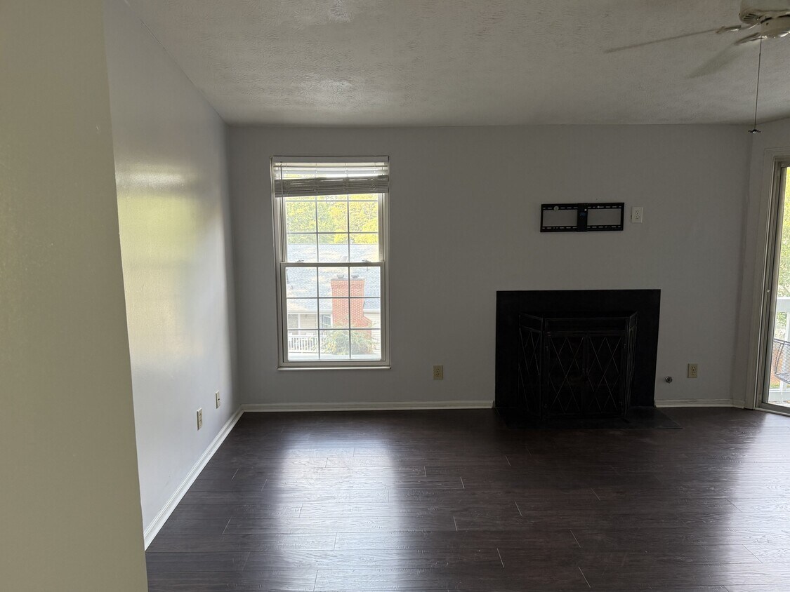 Living room - lots of natural light, working fireplace - 1483 Keys Crossing Dr NE (Brookhaven, GA)