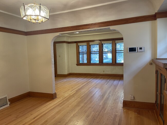 Open concept dining room and living room - 2567 N 61st St