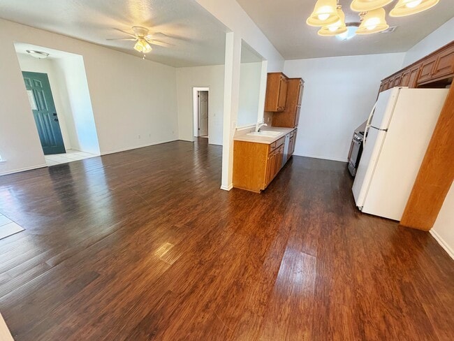 kitchen, dinning, and living areas - 5320 W 7th Ave