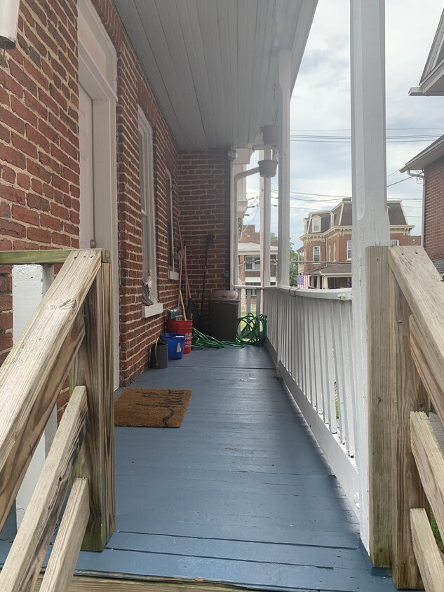 Main entrance. Covered porch. New door/locks. - 321 Lincoln Way W