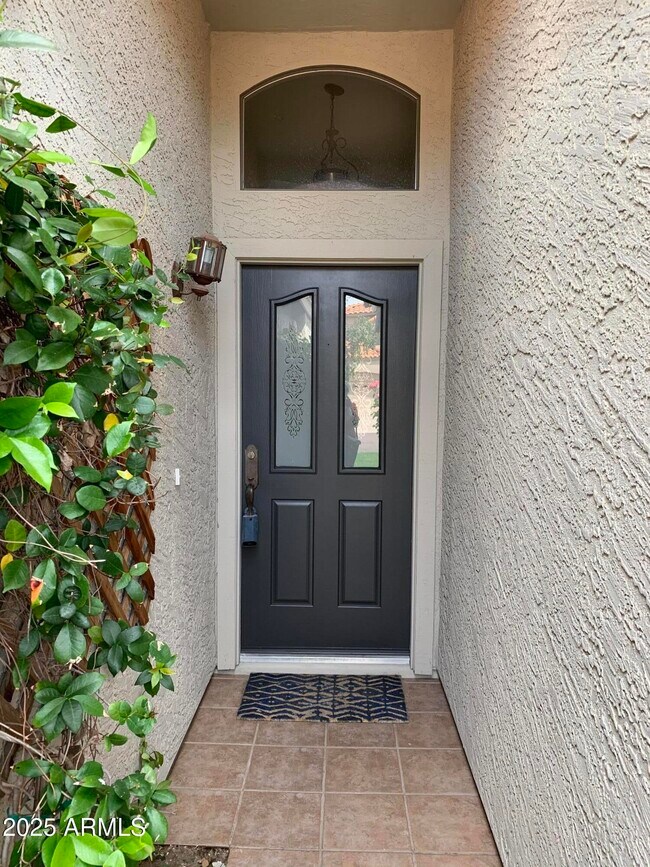 Building Photo - 8889 E Aster Dr