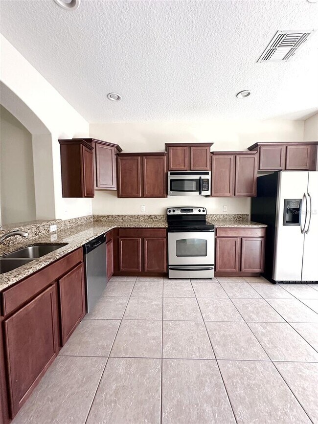 Building Photo - 4152 Shadetree Ln