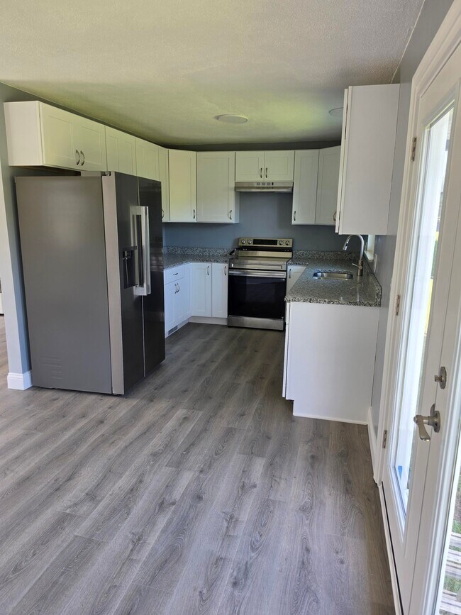 Foto del edificio - 421 River Bend Dr