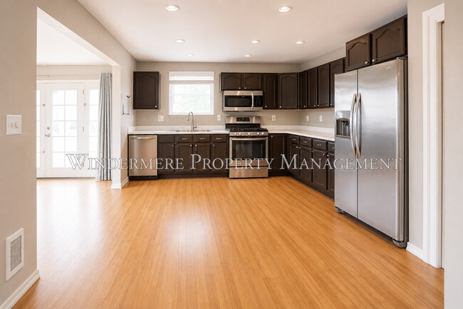 Building Photo - Three Bed Rambler on large fenced corner lot with patio