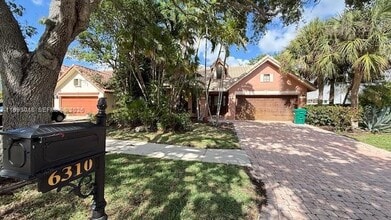 Building Photo - 6310 NW 58th Way