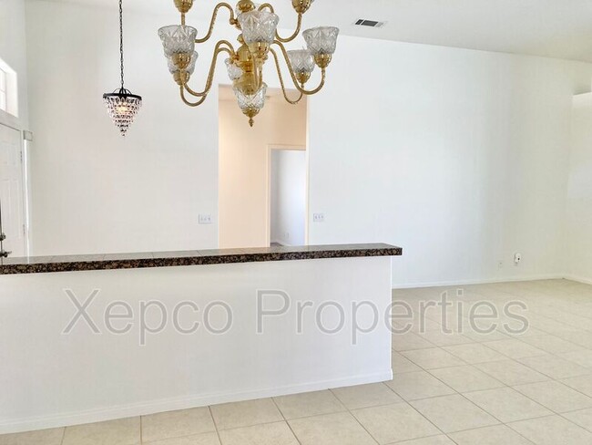 Building Photo - 74130 E Petunia Pl