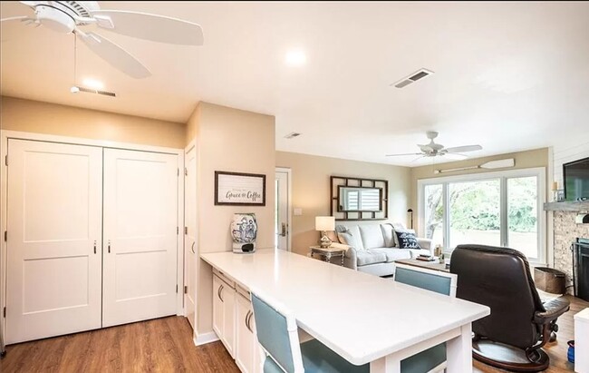 Kitchen includes lots of cabinet and quartz countertops + Pantry and Laundry - 2200 6th St NW