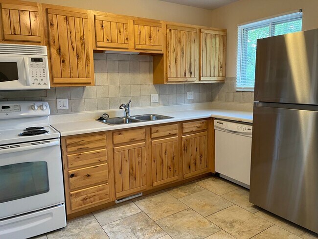 Building Photo - Make this  beautiful home yours!! Features...
