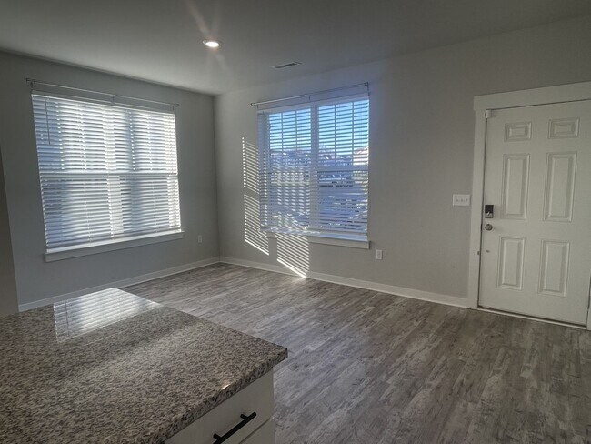 Building Photo - Triple Blackman Modern Townhome
