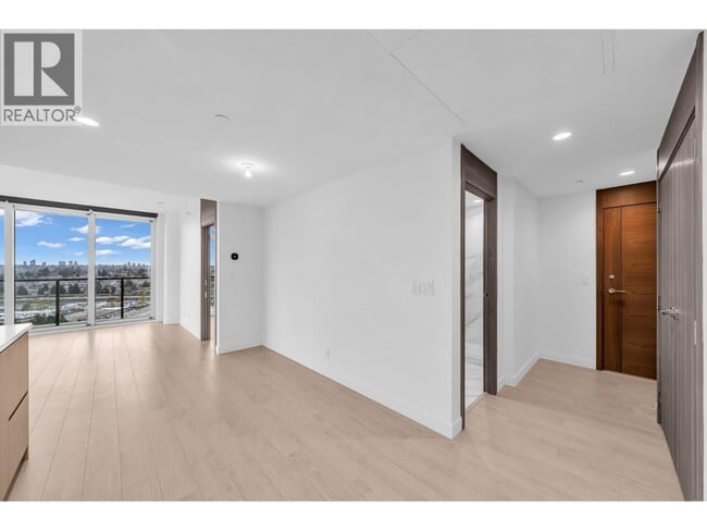 Building Photo - 4890 Lougheed Hwy.