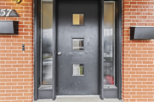 Door on Left Upstairs - 257 Noble Ave