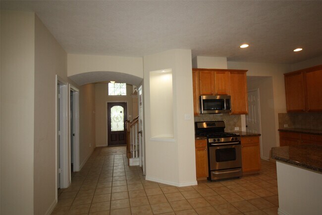 Foto del edificio - 7031 Thistlewood Park Ct