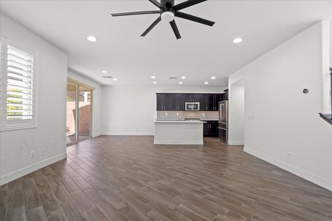 Building Photo - Modern Gated 3 Bedroom Retreat with Loft & Entertainer’s Backyard