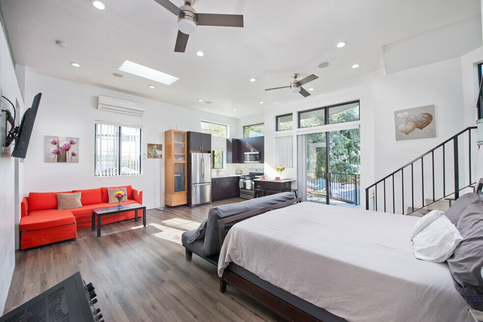 Image showcasing The Alphabet Streets Houses for Rent with High Ceilings - 3 Homes ...