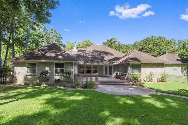 Building Photo - Empty Mandeville Home Seeking Family for O...