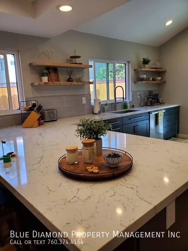 Building Photo - Remodeled 4 BR, 2 BA home in Santa Fe Ridg...