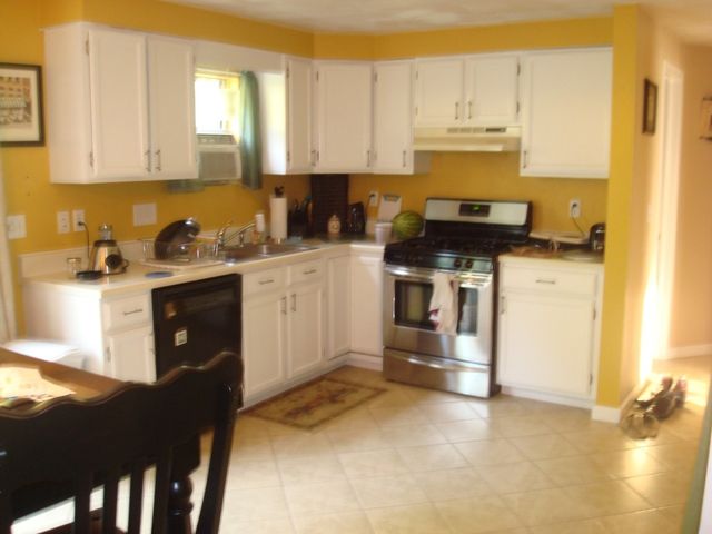 Bright kitchen with stainless steel appliance - 302 Hooper Rd