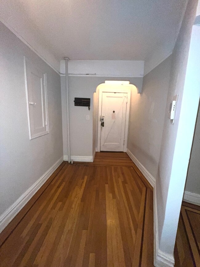 Hallway, Foyer and Entry Door - 7119 Shore Rd