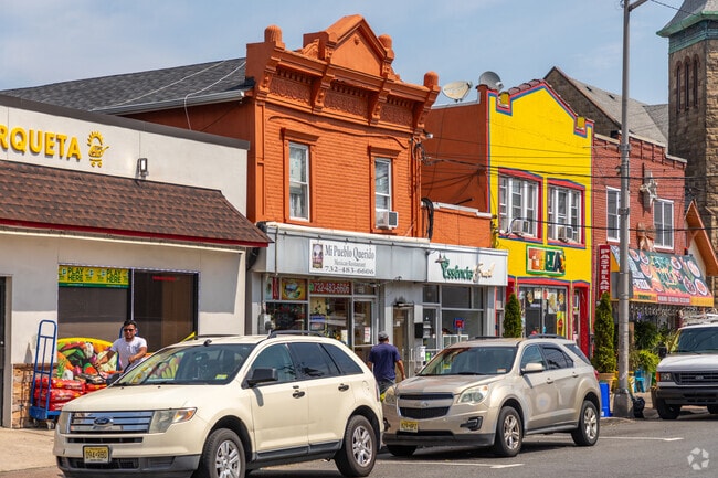 Downtown Long Branch has a bustling main street with several storefronts.