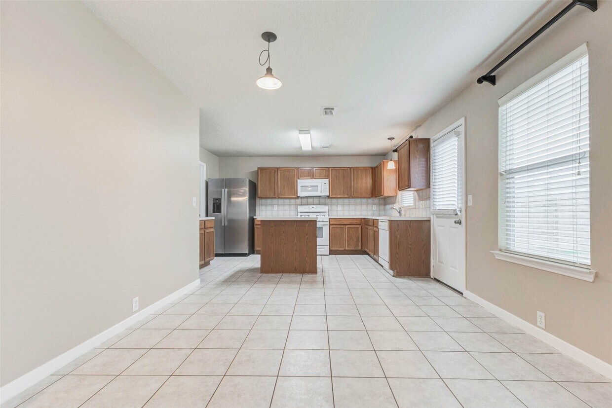 Building Photo - 18327 Atasca Wds Trce