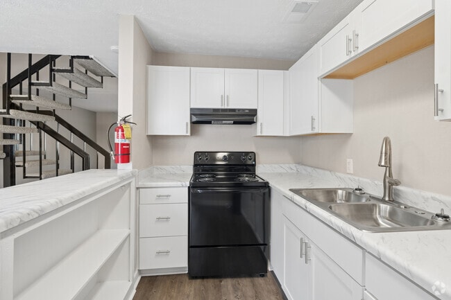 2 habitaciones, 1,5 baños - 1350 pies cuadrados - Cocina - London Trace Townhomes