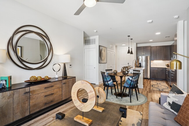Kitchen, living, and dining area with hard surface flooring - Avalon Castle Hills