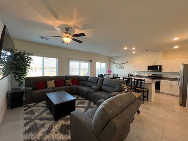 Building Photo - FULLY FURNISHED!!! beautiful 3 bedroom 2 and half bath home is located in the Symmetry Bay Cadenc...