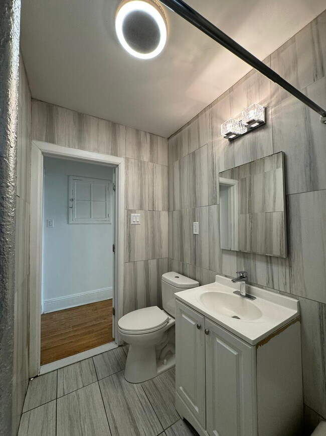 Building Photo - 6099-6001 Hudson Ave