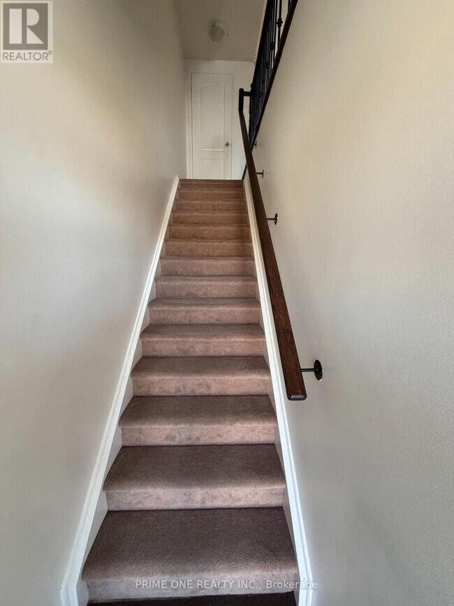 Photo du bâtiment - 5605 Oscar Peterson Blvd