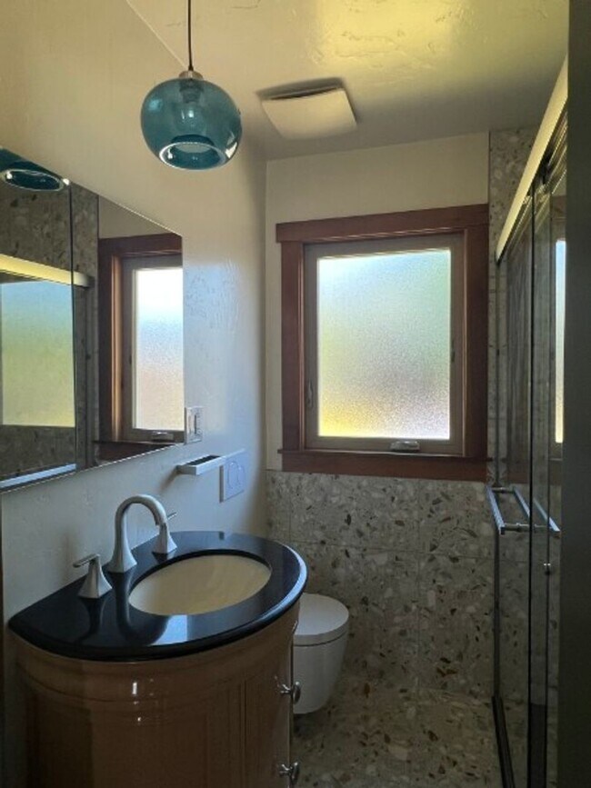 Building Photo - Artisan-Built Custom Cottage Retreat | Private Yard, Garage & EV Charging Ready