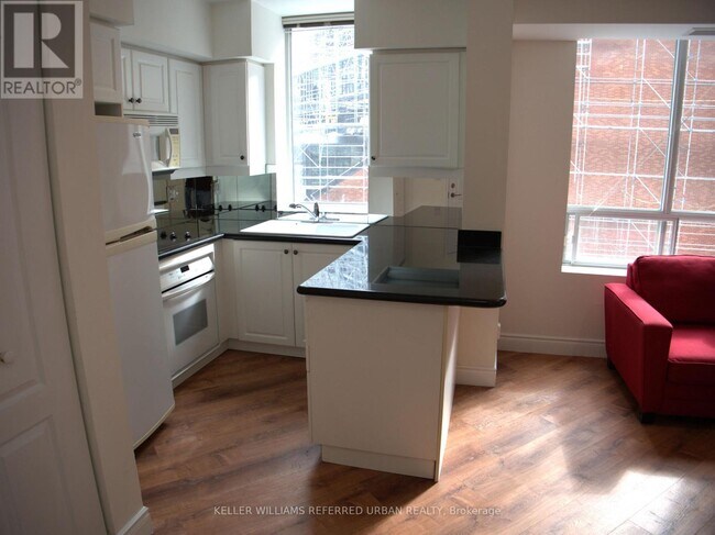 Photo du bâtiment - 20 Collier St