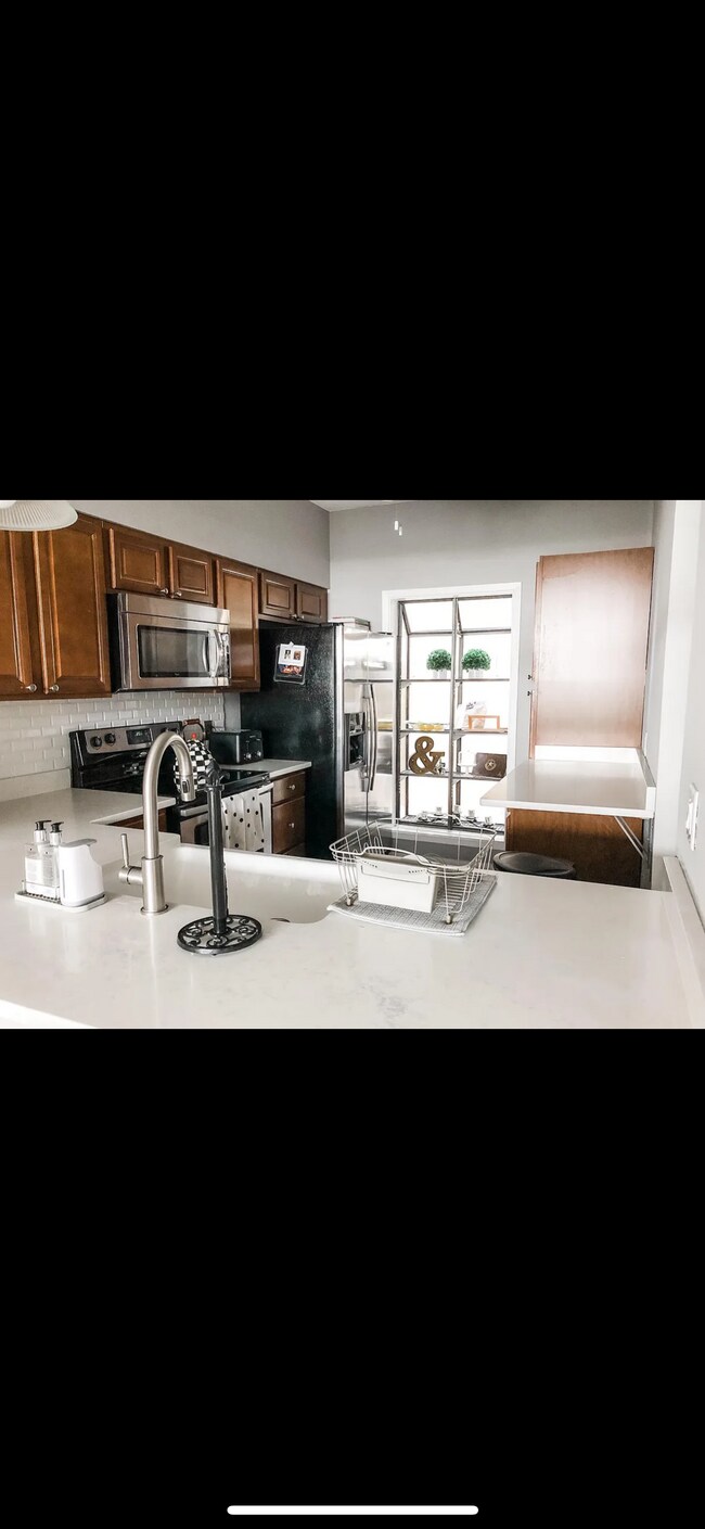 Foto del edificio - 5105 Beachwalk Pl