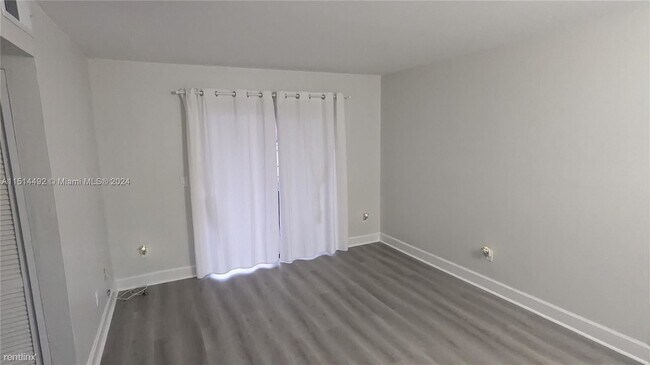 Building Photo - 3 br, 2 bath House - 6460 W 27th Ct # 13-53