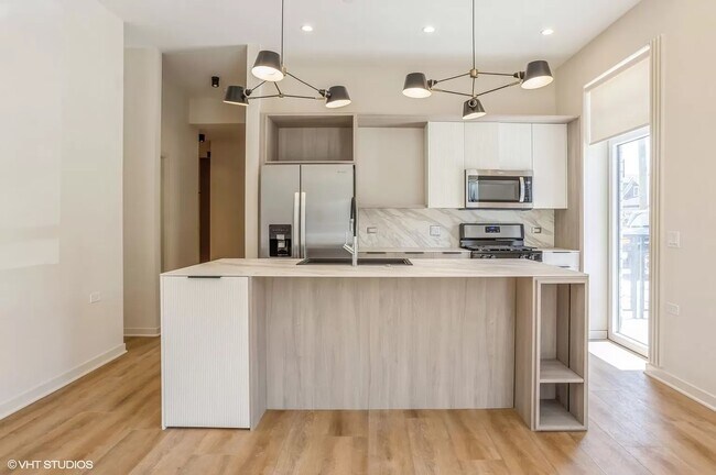 Foto del edificio - 3153 N Tripp Ave