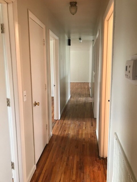 Hallway to bedrooms - 3800 Woodward Dr