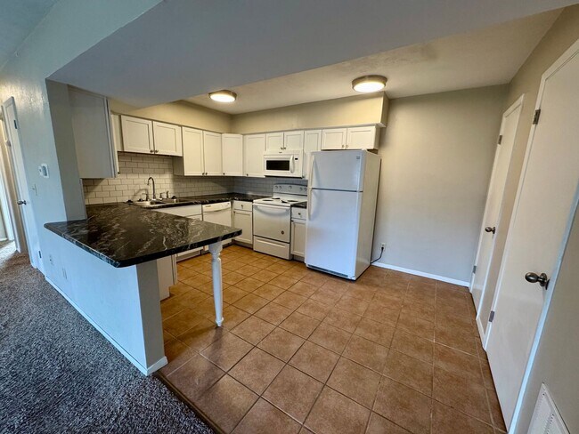 Building Photo - Updated 2BR with Balcony – Second Level Apartment