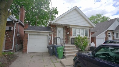 Building Photo - 881 Coxwell Ave