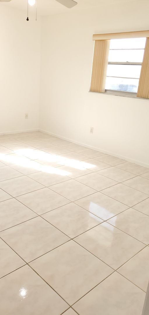 Photo - Charming 2 Bedroom Duplex with Tiled Floor... House