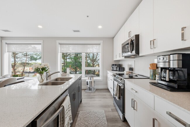 Building Photo - 2 Bedroom Furnished Apartment Elation Suites - Plan A1