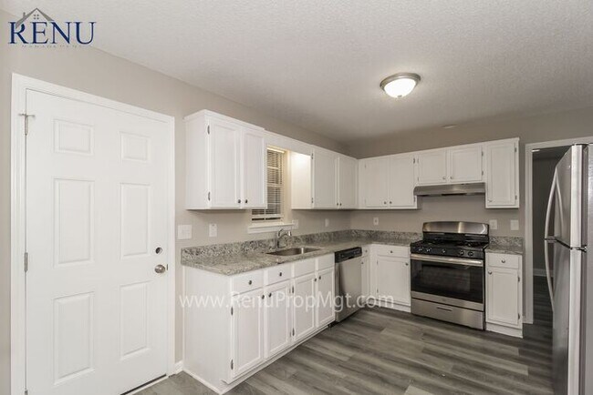 Building Photo - Available Now!