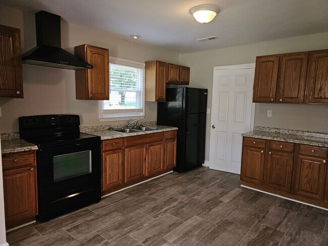 Building Photo - New to Rental Market- Brick Ranch Home wit...