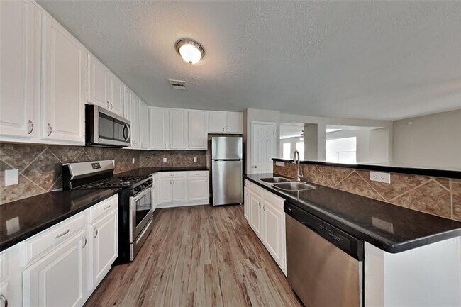 Foto del edificio - 3119 Peachstone Pl