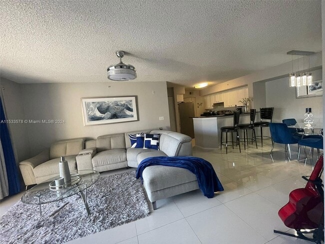 Building Photo - 8235 Ibis Club Drive Unit 310