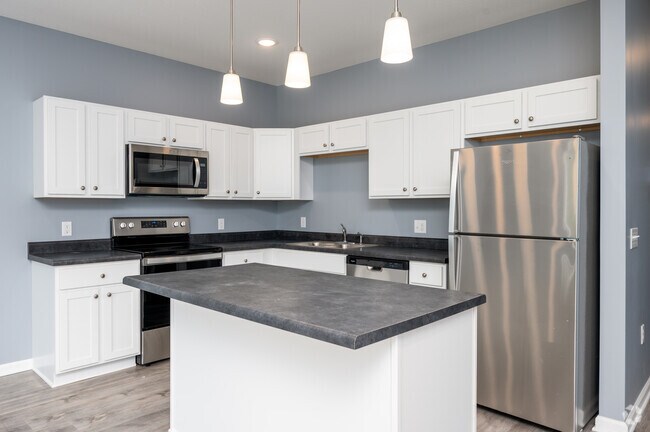 3 habitaciones, 2.5 baños - 1,500 pies cuadrados - Cocina - Homestead Townhomes